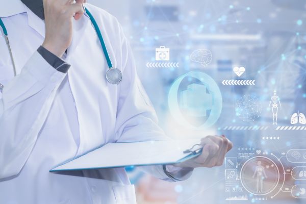 A doctor holding a patient's medical chart.