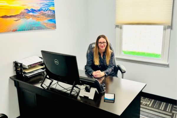 A Nurse sitting on her Office 